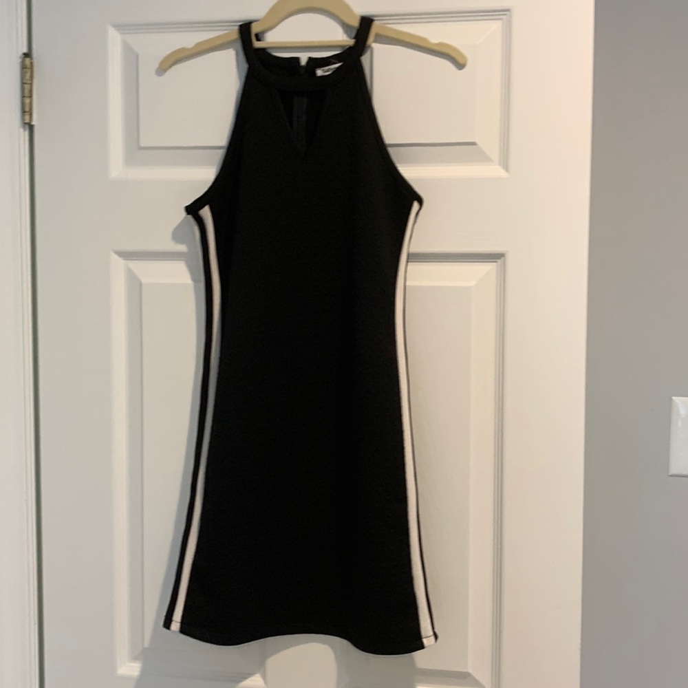 Black dress with white stripes along side